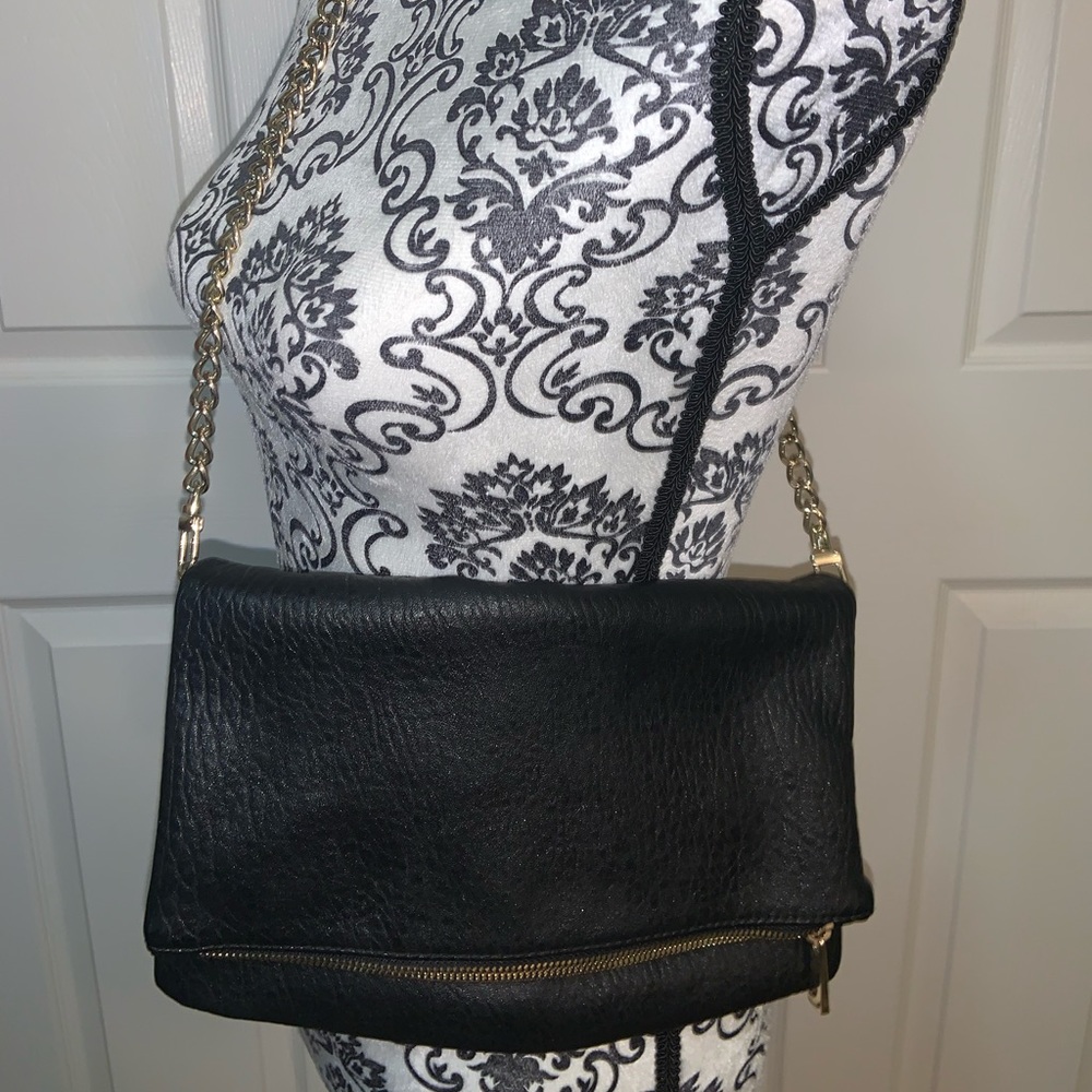 Black shoulder and clutch purse